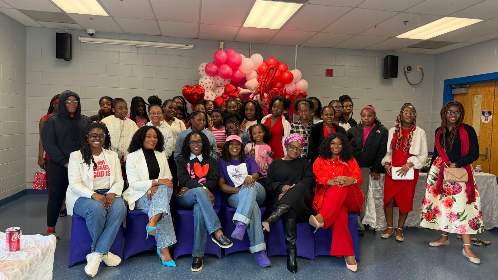 Girls and coaches together at a Responsible Girls Forum celebration